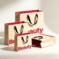 Sacs en papier mat brun de luxe personnalisés avec poignée en ruban doré et logo en relief pour vêtements, cosmétiques et cadeaux - Prix usine