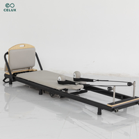 Nouvelle conception, machine de Pilates pliable portable en acier au carbone gris rose, de haute qualité, durable, pour la maison, le studio et la remise en forme