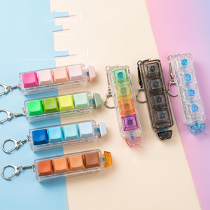 Oferta Especial: Llavero Antiestrés con Teclado Transparente de 5 Teclas, 22 Diseños, Juguete Sensorial para Aliviar el Estrés - Product Image 2