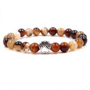 <span class=keywords><strong>Bracelet</strong></span> élastique <span class=keywords><strong>transparent</strong></span> en <span class=keywords><strong>fil</strong></span> de 8 mm avec œil de tigre et turquoise blanche, motif dents de chien, vente chaude en usine - Product Image 1