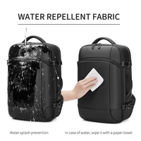 Sac à dos professionnel grande capacité étanche pour ordinateur portable avec fermeture éclair, ceinture à coussin d'air et doublure de compression sous vide, idéal pour les voyages