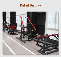 Entraîneur de levage de bras latéral commercial avec tube ovale plat chargé de plaque équipement de Fitness de gymnastique en acier de qualité supérieure à haute intensité