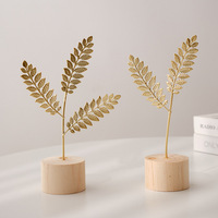 Décorations de style nordique en métal de luxe léger pour la maison, le salon, l'entrée, le meuble à vin, ornements en fer forgé en forme de feuille de Ginkgo