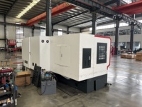 Tour CNC industriel automatique à double broche centrale 5 axes de conception nouvelle pour le traitement des pièces métalliques (perceuses/tubes/arbres)