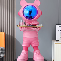 Statue d'astronaute de dessin animé créatif avec lumière pour chambre à coucher ou salon Statuette de sol en résine/FRP pour centres commerciaux