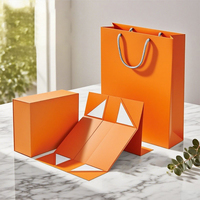 Boîte cadeau magnétique pliable sophistiquée en une seule pièce avec poignée, design plat rigide, revêtement UV, ruban pour demoiselle d'honneur