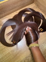 Cheveux vierges bruts non traités, Cheveux indiens bouclés bruts, Cheveux vietnamiens bruts de donneur, lisses comme des baguettes
