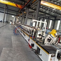 Machine de formage à froid pour rayonnages verticaux d'entrepôt entièrement automatiques, machine de fabrication de rayonnages de stockage en profilés d'acier, moteur à engrenages PLC BSY