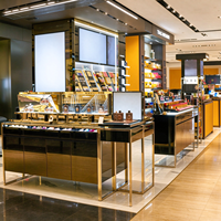 Vitrine de présentation cosmétique noire et or, comptoir îlot, vitrine à parfums en verre, boîte lumineuse, armoires murales pour grand magasin CE ETL
