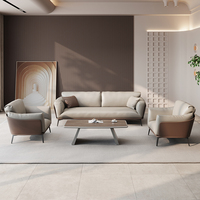 Ensemble canapé et table basse de bureau en cuir, design moderne et épuré, produit phare pour la réception et les négociations professionnelles