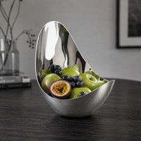 Bol à fruits ovale sculptural moderne en acier inoxydable poli, durable, pour la décoration de la maison, les fêtes et comme centre de table.