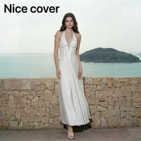Robe de soirée blanche fluide à col halter et décolleté plongeant avec nœud et strass, idéale pour les vacances à la plage et les soirées – Nouvelle collection très prisée