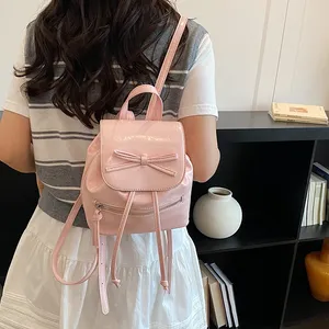 Sac à dos en cuir PU 2026 pour femme avec nœud, sac de voyage décontracté léger à cordon de serrage et rabat pour usage quotidien - Product Image 2