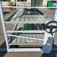 Système d'irrigation hydroponique pour serres agricoles, avec tables de culture roulantes, plateaux et bacs de semis à flux et reflux