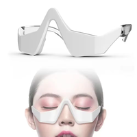 Prix d'usine Appareil portable en silicone anti-rides pour les yeux et le visage, réduction des cernes et des poches sous les yeux, technologie micro-courant et chaleur, étanche