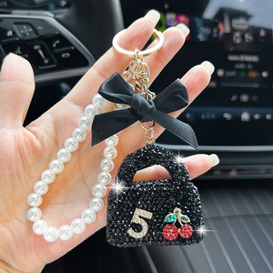 Porte-clés Sac Diamant Complet Créatif avec Chaîne de Perles et Nœud, Pendentif Diamant Brillant Personnalisé Exquis pour Voiture - Product Image 2