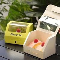 Boîte alimentaire pliable en carton solide de qualité alimentaire avec fenêtre transparente en PVC et bordure gaufrée pour pâtisseries et desserts