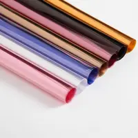 Разноцветные целлофановые рулоны прозрачная целлофановая пленка