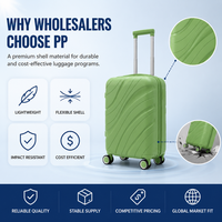 Valise de voyage rigide en PP vert menthe, prête pour l'audit d'usine, roues pivotantes, texture ondulée, poignée latérale, assortiment de vente au détail ODM