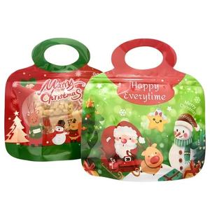 Hot Selling Festive Christmas Themed Portable Handle Plastic <strong>Bags</strong> for Snack Candy Gift Packaging in <strong>Holiday</strong> Party Retail Store - Product Image 1