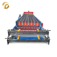 Machine de formage à froid de tôles et panneaux muraux en métal double pour toitures