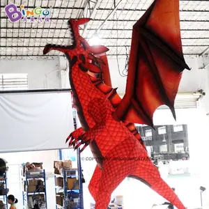 Drago rosso volante gonfiabile appeso personalizzato con decorazione pubblicitaria del fumetto delle ali per la festa all'aperto dell'esposizione
