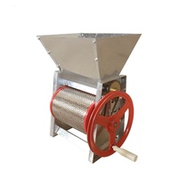 Prix de gros, petit pulpeur manuel de grains de café frais/machine à éplucher le café pour l'Afrique