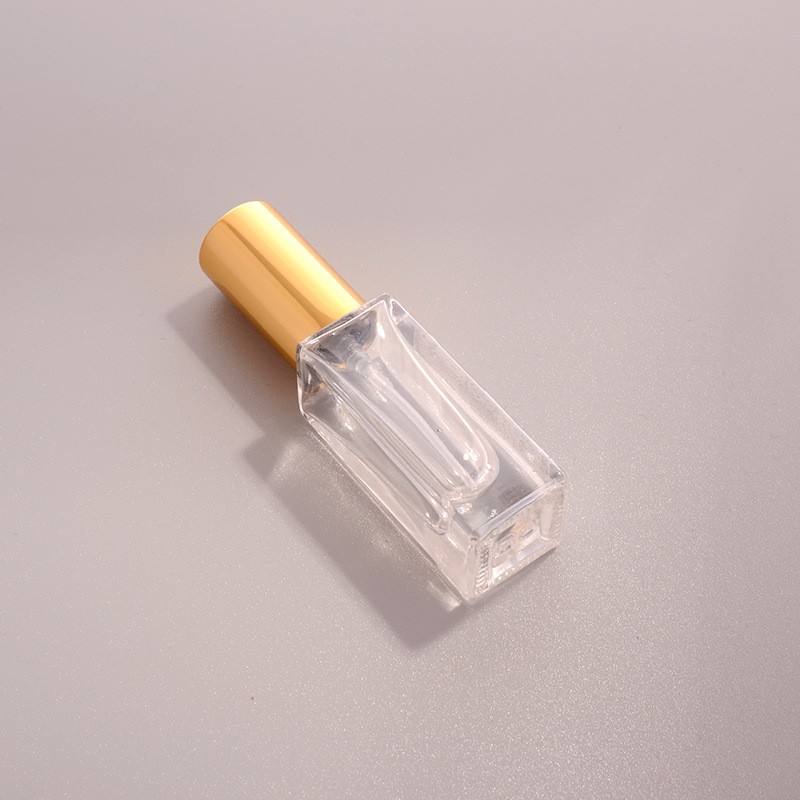 transparent bottle with gold lid