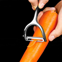 Multifunctionele 2-in-1 roestvrijstalen mes handmatige fruit- en groenteschiller, antiaanbaklaag, vaatwasserbestendig.