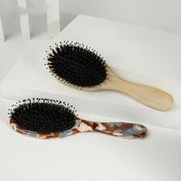 Antistatische Luftkissen-Haarbürste Oval mit Acetat-Griff und Borsten