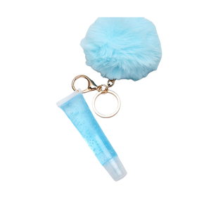 ลิปกลอสบนพวงกุญแจปอมปอมฟัซซี่รสผลไม้ให้ความชุ่มชื่น - Product Image 1