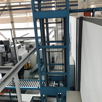 Otomatisasi Jalur Perakitan Industri dengan Elevator Pengangkat Pallet Terkontrol PLC Garansi 1 Tahun Sabuk Baja Kecepatan Dapat Diatur