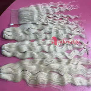 Vente en gros de trame de cheveux vierges bouclés blonds 613 Extensions de faisceaux de cheveux humains bruts à cuticule alignée Approvisionnement direct d'usine - Product Image 1