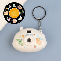 Mini Cartoon Projectiecamera Sleutelhanger met 8 patronen, diaprojectorlamp, speelgoed, cadeau voor kinderfeestjes
