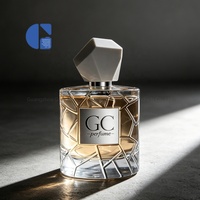 Flacon de parfum en verre transparent cylindrique de luxe, coupe géométrique, 100 ml, avec bouchon, logo personnalisable, boîte d'emballage