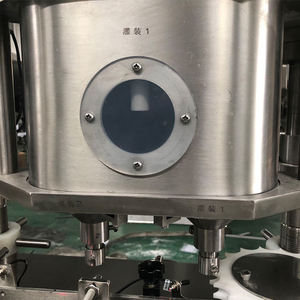 Línea pequeña de aceite caliente para botellas y llenador de barrena líquida <span class=keywords><strong>Macasa</strong></span> Cream Coudre Pour Fille De 9Ans máquina de llenado - Product Image 5