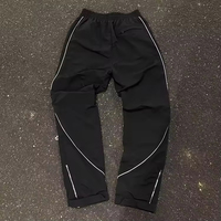 Conjunto de Chándal Reflectante 3M Personalizado para Hombre con Chaqueta Rompevientos y Pantalones de Nailon de Alta Visibilidad para Seguridad y Correr de Fábrica OEM