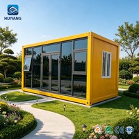 Maison conteneur préfabriquée en acier moderne et portable de 20 pieds avec mur en verre pour une construction rapide en extérieur