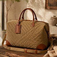 Sac de voyage extensible tendance 2027 en tissu matelassé pour hommes et femmes, sac de sport rembourré avec poignées tressées, logo de marque personnalisé OEM