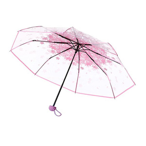 Venta al por mayor <span class=keywords><strong>precio</strong></span> barato OEM impermeable Sakura lindo impermeable a prueba <span class=keywords><strong>de</strong></span> viento tres paraguas plegable transparente para niñas mujeres - Product Image 1