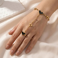 Bracelet en acier inoxydable doré avec anneau en forme de cœur noir tendance