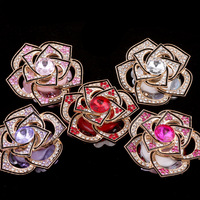 Vente en gros de perles fantaisie à fleurs creuses pour fabrication de stylos pour femmes et filles, perles roses rotatives en cristal avec strass, jouets de fabrication de bijoux pour bricolage
