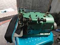 Machine à coudre industrielle Merrow MG3U Emblem Edge 3 fils d'occasion Offre Spéciale