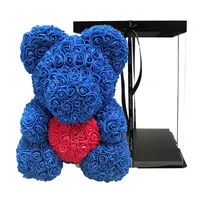 Meilleure vente : Ours en peluche rose artificiel avec fleurs en PE de 25 cm et boîte cadeau transparente