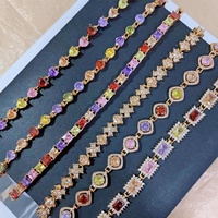 Bracelet en cuivre plaqué or en gros, serti de micro-diamants VVS Zircon, style Ice Out, avec breloque œil baguette pour femme