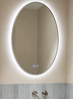 Miroir de salle de bain mural intelligent à cadre argenté de style elliptique