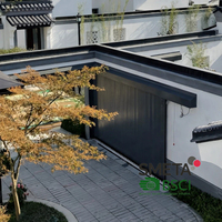 Porte de garage sectionnelle automatique en aluminium et composite fluorocarboné Andexin American Standard