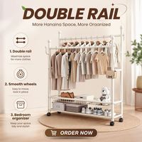 Portant à vêtements mobile moderne à double tringle avec panier de rangement en maille, sur roulettes, pour la maison et l'affichage en magasin