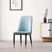 Chaise de salle à manger légère en métal et cuir PU, design minimaliste moderne nordique, prix d'usine, pour hôtel, restaurant de luxe