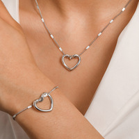 Ensemble de bijoux simple 2 pièces/ensemble, bracelet avec pendentif cœur plaqué or 18 carats, collier avec pendentif cœur creux en acier inoxydable